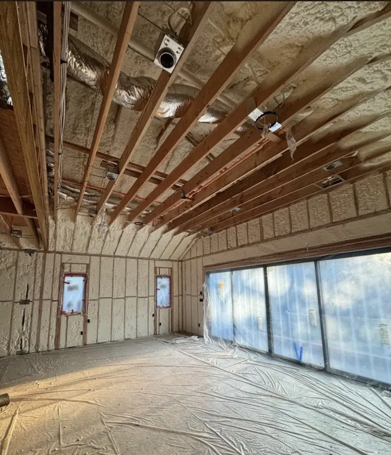 Interior walls and ceiling insulated with spray foam during new construction in Bullard